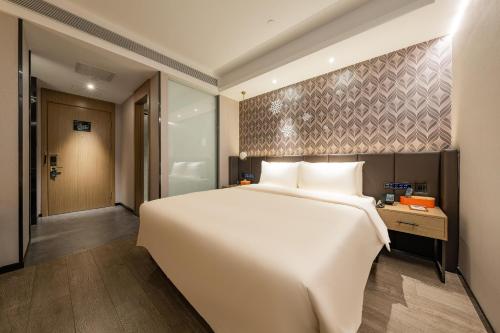 Imagen de la habitación del Hotel Atour X Beijing Sanyuan Bridge. Foto 20