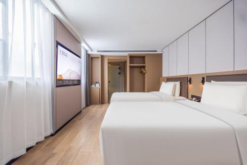 Imagen de la habitación del Hotel Atour X Changsha Jintai Plaza Metro Station Wanjiali Middle Road. Foto 4