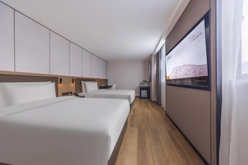 Imagen de la habitación del Hotel Atour X Changsha Jintai Plaza Metro Station Wanjiali Middle Road. Foto 5