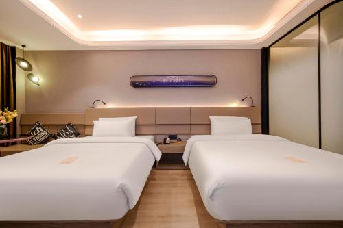 Imagen de la habitación del Hotel Atour X Chaozhou Xiangqiao International Financial Business Center. Foto 9