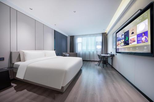 Imagen de la habitación del Hotel Atour X Guangzhou Baiyun International Airport Renhe Station. Foto 14