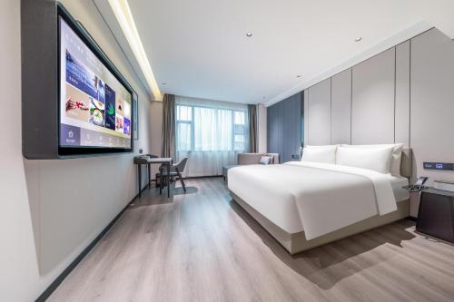 Imagen de la habitación del Hotel Atour X Guangzhou Baiyun International Airport Renhe Station. Foto 16