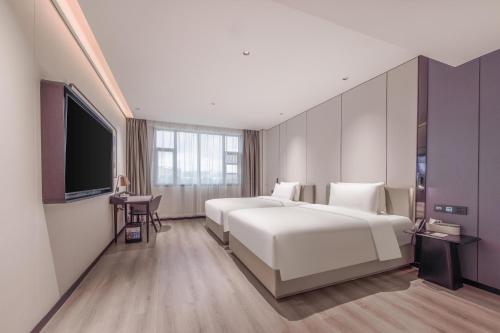Imagen de la habitación del Hotel Atour X Guangzhou Baiyun International Airport Renhe Station. Foto 18
