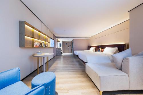 Imagen de la habitación del Hotel Atour X Haikou International Trade Center. Foto 9