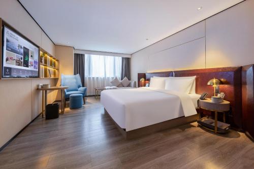Imagen de la habitación del Hotel Atour X Haikou International Trade Center. Foto 12