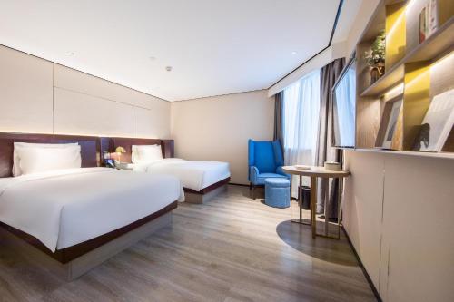 Imagen de la habitación del Hotel Atour X Haikou International Trade Center. Foto 14