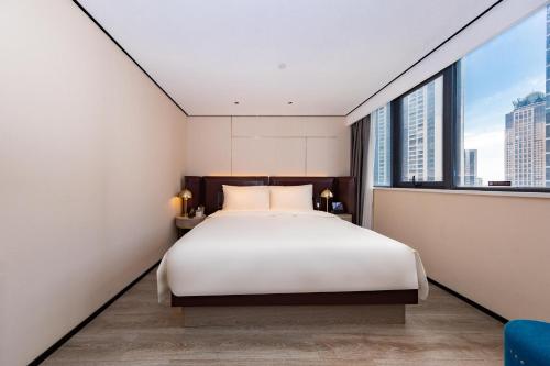 Imagen de la habitación del Hotel Atour X Haikou International Trade Center. Foto 15