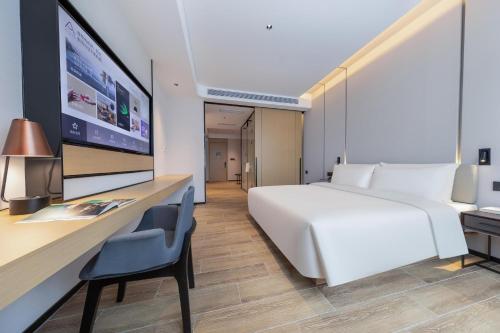 Imagen de la habitación del Hotel Atour X Haikou International Trade Center. Foto 18
