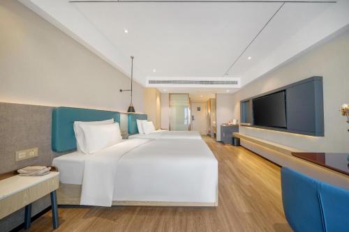 Imagen de la habitación del Hotel Atour X Harbin West Railway Station. Foto 9