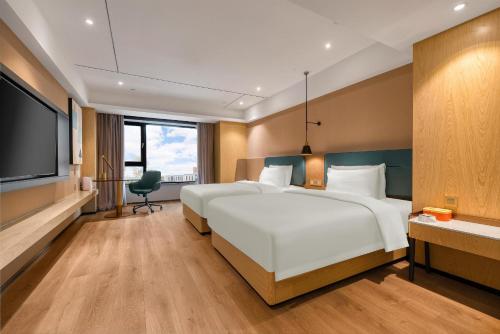 Imagen de la habitación del Hotel Atour X Harbin West Railway Station. Foto 14