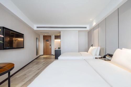 Imagen de la habitación del Hotel Atour X Kunming Cultural Palace East Renming Road. Foto 7