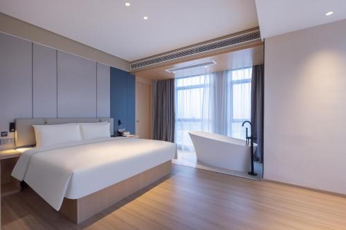 Imagen de la habitación del Hotel Atour X Nanjing Jiangning Future Internet Town. Foto 13