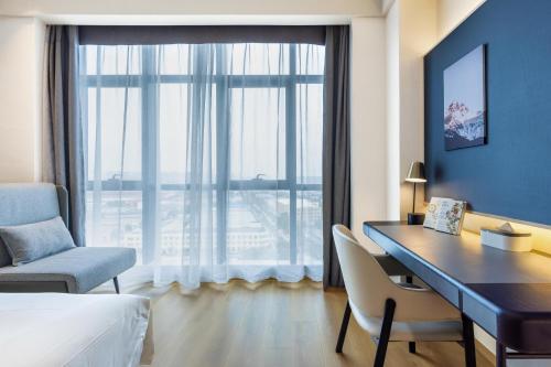 Imagen de la habitación del Hotel Atour X Nanjing Jiangning Future Internet Town. Foto 14