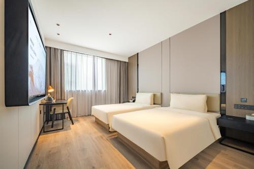 Imagen de la habitación del Hotel Atour X Shanghai Central Bailian Tongchuan Road Station. Foto 16