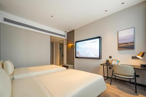 Imagen de la habitación del Hotel Atour X Shanghai Central Bailian Tongchuan Road Station. Foto 17