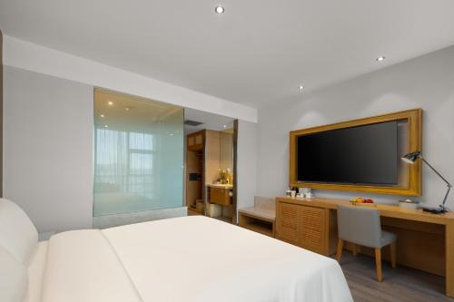 Imagen de la habitación del Hotel Atour X Shanghai International Tourism and Resort Safari Park. Foto 17