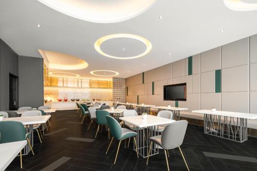 Imagen del bar/restaurante del Hotel Atour X Shanghai International Tourism and Resort Safari Park. Foto 8