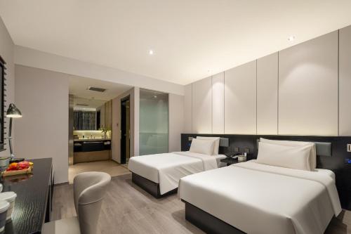 Imagen de la habitación del Hotel Atour X Shanghai International Tourism and Resort Safari Park. Foto 18