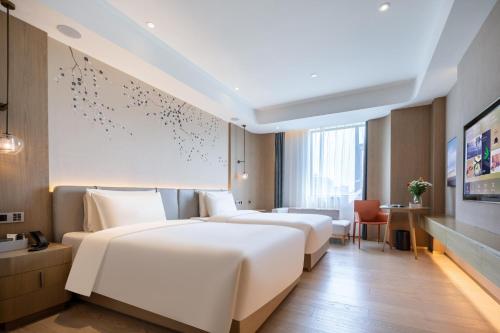 Imagen de la habitación del Hotel Atour X Shanghai Jinshan Wanda Plaza City Beach. Foto 11