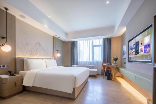 Imagen de la habitación del Hotel Atour X Shanghai Jinshan Wanda Plaza City Beach. Foto 12