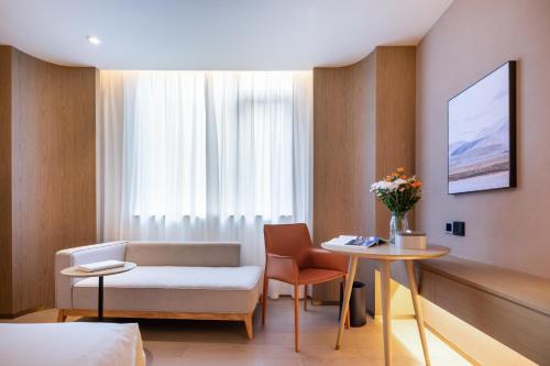 Imagen de la habitación del Hotel Atour X Shanghai Jinshan Wanda Plaza City Beach. Foto 18