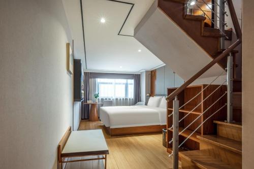 Imagen de la habitación del Hotel Atour X Shanghai Lujiazui Binjiang Avenue. Foto 6