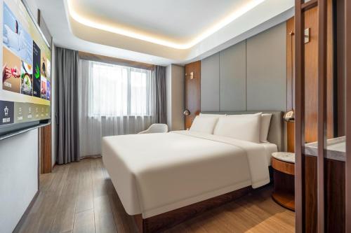 Imagen de la habitación del Hotel Atour X Shanghai Lujiazui Binjiang Avenue. Foto 7
