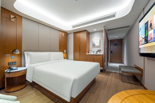 Imagen de la habitación del Hotel Atour X Shanghai Lujiazui Binjiang Avenue. Foto 10