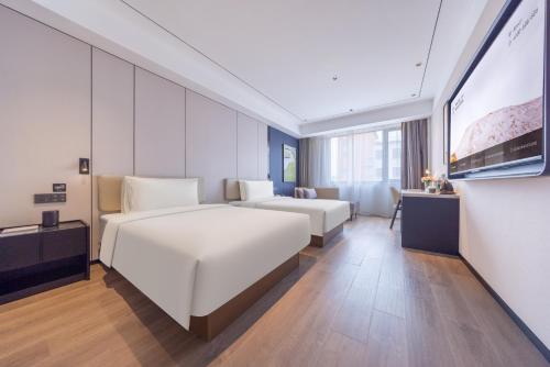Imagen de la habitación del Hotel Atour X Shanghai Pujiang Lianhang Road. Foto 16