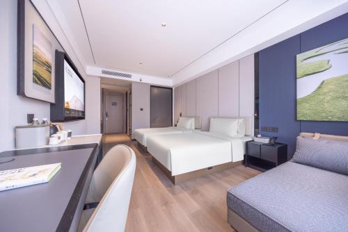 Imagen de la habitación del Hotel Atour X Shanghai Pujiang Lianhang Road. Foto 17