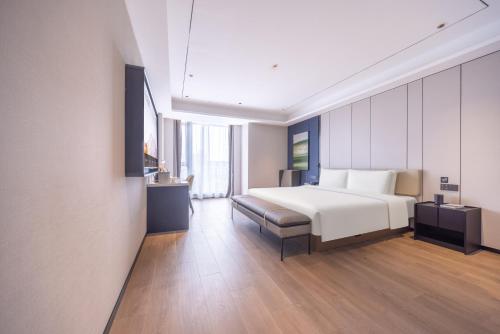 Imagen de la habitación del Hotel Atour X Shanghai Pujiang Lianhang Road. Foto 18