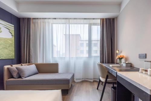 Imagen de la habitación del Hotel Atour X Shanghai Pujiang Lianhang Road. Foto 19