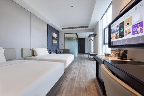 Imagen de la habitación del Hotel Atour X Shanghai Shuguang Wusong Cruise Terminal. Foto 11