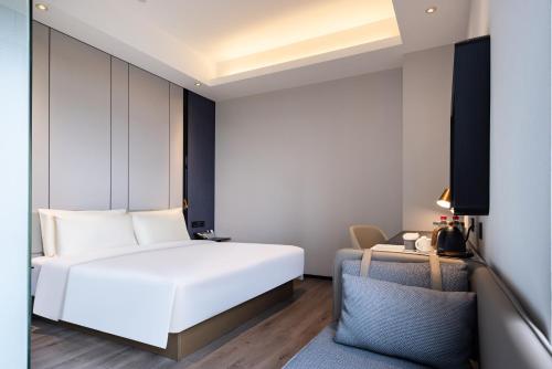 Imagen de la habitación del Hotel Atour X Shanghai Shuguang Wusong Cruise Terminal. Foto 12