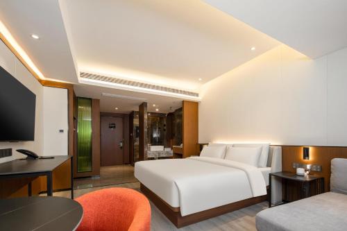 Imagen de la habitación del Hotel Atour X Taizhou Jiangyan. Foto 16