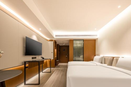 Imagen de la habitación del Hotel Atour X Taizhou Jiangyan. Foto 19