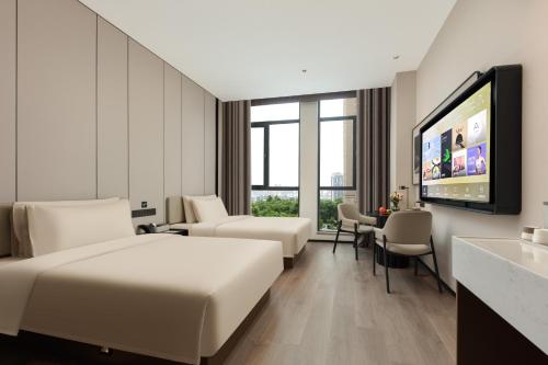 Imagen de la habitación del Hotel Atour X Tongyang South Road Wuxi People\'s Hospital. Foto 3