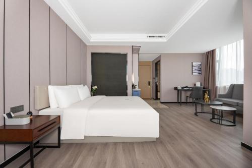 Imagen de la habitación del Hotel Atour X Urumqi Railway Bureau Satellite Plaza. Foto 17