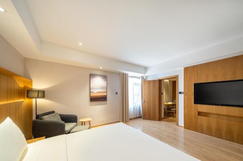 Imagen de la habitación del Hotel Atour X Wuxi Binhu Sports Center. Foto 10