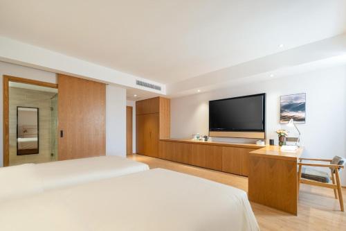Imagen de la habitación del Hotel Atour X Wuxi Binhu Sports Center. Foto 12