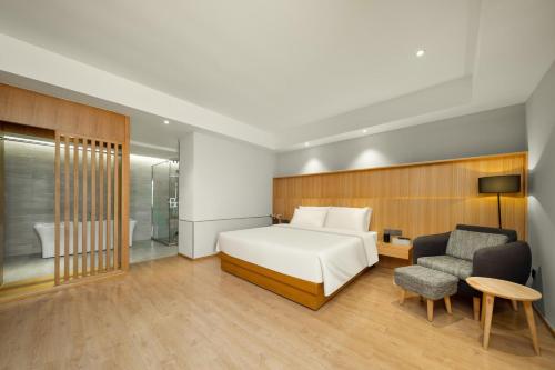 Imagen de la habitación del Hotel Atour X Wuxi Binhu Sports Center. Foto 14