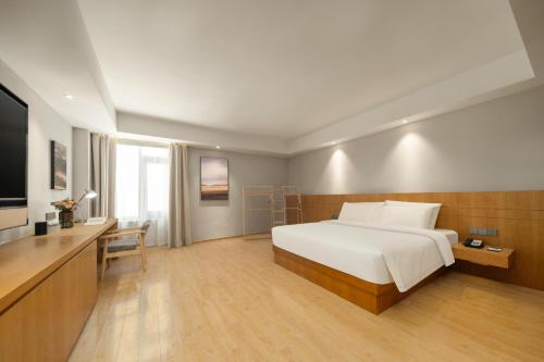 Imagen de la habitación del Hotel Atour X Wuxi Binhu Sports Center. Foto 16