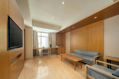 Imagen de la habitación del Hotel Atour X Wuxi Binhu Sports Center. Foto 17