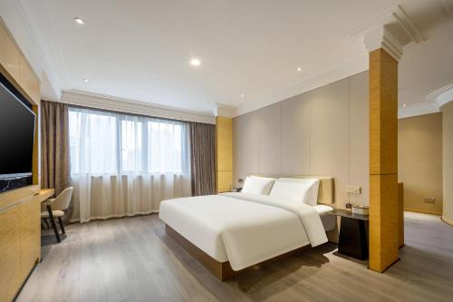 Imagen de la habitación del Hotel Atour X Wuxi Sanyang Plaza Zhongshan Road. Foto 11