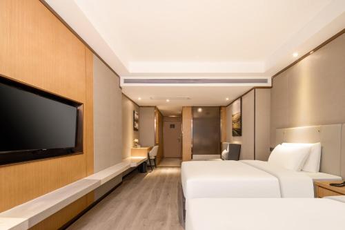 Imagen de la habitación del Hotel Atour X Wuxi Sanyang Plaza Zhongshan Road. Foto 14