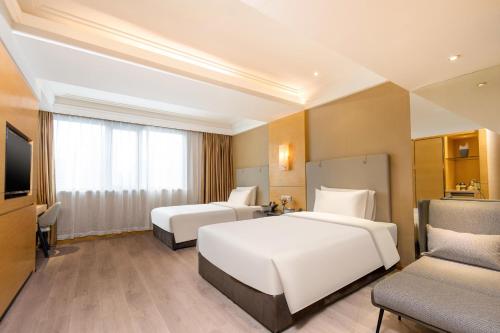 Imagen de la habitación del Hotel Atour X Wuxi Sanyang Plaza Zhongshan Road. Foto 15