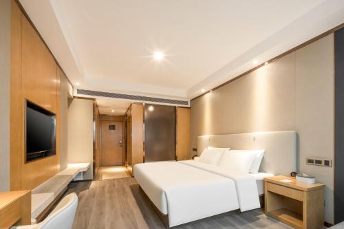 Imagen de la habitación del Hotel Atour X Wuxi Sanyang Plaza Zhongshan Road. Foto 16