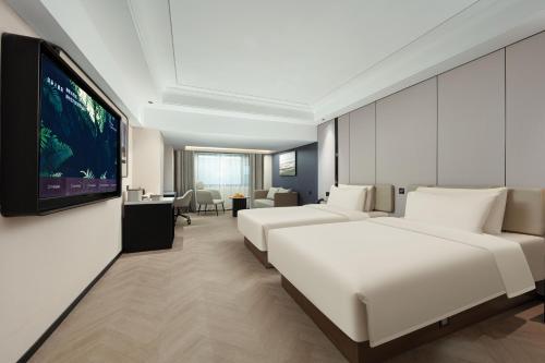Imagen de la habitación del Hotel Atour X Xiamen Exhibition Center Gudishi Station. Foto 7