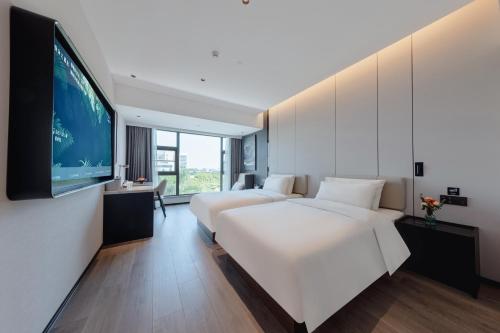 Imagen de la habitación del Hotel Atour X Xiamen Gaoqi Airport Huli Innovation Park Metro Station. Foto 2