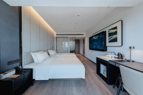 Imagen de la habitación del Hotel Atour X Xiamen Gaoqi Airport Huli Innovation Park Metro Station. Foto 3